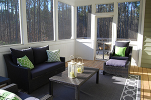 Steps for building a sunroom include wall window and floor installations
