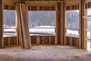 Steps for building a sunroom include putting in walls with window openings